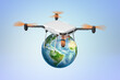 Drone flying above a small globe
