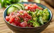 colorful poke bowl bursts with the freshness of sashimi-grade tuna, ripe avocado, crisp cucumber