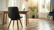 © Charisma Art Studio - modern chair near an office desk in the living room, with wooden flooring and natural light streaming through large windows, copy text space, working from home concept