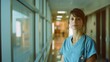 © cong - Portrait of young woman doctor at hospital corridor