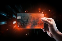 Bright Credit, Debit Card, Bonus Card In Hand. Concept Of The Consumer On Dark Background