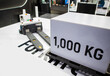 © Itsanan - Automated guided vehicle carry box. AI forklift robot in modern warehouse.