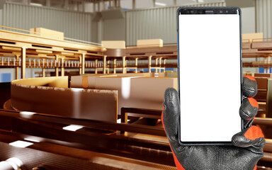 Poster - Phone near warehouse conveyor. Smartphone with blank screen. Production line with boxes. Phone for fulfillment application. Place for ads warehouse services. Hand with phone in fulfillment center