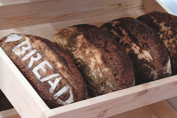 Poster - Fresh fragrant bread on the table. Food concept