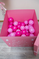 Wall Mural - pink balloons in a large gift box