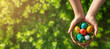 Easter celebration, hands with the basket full with painted eggs. 