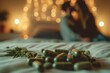 Cannabis pills laying over a bed with a blurred couple in the background. Cannabis, relationship and aphrodisiac concepts