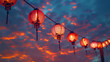 top down foto of hanging round red Chinese lanterns at night on line under sky with clouds