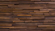 © Jakob - wallpaper background of horizontal 3d brown wood nut cladding panels on wall