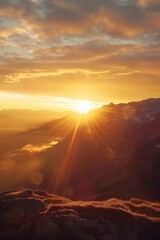 Canvas Print - A person standing on top of a mountain at sunset. Suitable for outdoor and adventure themes