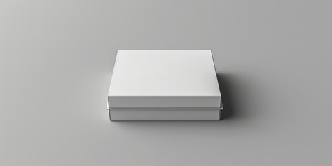 Poster - A white box sitting on top of a table, perfect for product displays