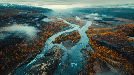 Poster - Aerial view of a river flowing through a scenic valley. Ideal for nature and landscape backgrounds