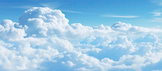 Wall Mural - An image showing the perspective of the sky as seen from inside an airplane