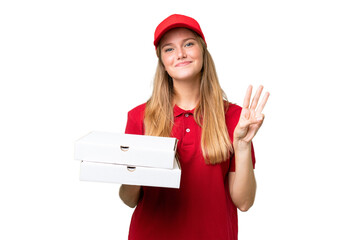 Wall Mural - Young caucasian pizza delivery woman with work uniform picking up pizza boxes over isolated background happy and counting three with fingers