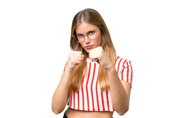 Wall Mural - Young beautiful woman over isolated background with fighting gesture