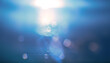 Blue abstract smooth bokeh light leak, water blurred motion, sunlight lens flare