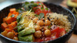 Fresh vegan quinoa bowl with avocado chickpeas sweet