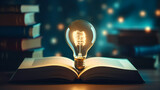 Fototapeta Do akwarium - Light bulbs popping out of books as inspiration and innovative ideas