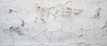 A Detailed View Of A White Wall With Peeling Paint Revealing The Old Surface Underneath
