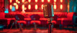 Close up view microphones in the bar, cafe neon red ambience light with empty chair, place for text. Cabaret comedy show opera music concert club, standup scene.