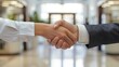 © Irina - Business people man and woman shaking hands wallpaper background