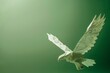 photo of an origami Eagle on pastel green background