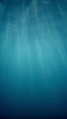 Poster - Sunlight beams filter through the deep, crystal-clear, blue-turquoise water, casting a beautiful curtain of reflections. Air bubbles rise gracefully towards the water's surface, adding to the pictures