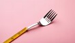 fork with measurement tape on color background