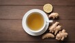 Top view of ginger tea on wooden background