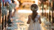 a beautiful little flower girl in a white dress at a wedding