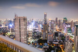 Fototapeta Paryż - aerial night view of Bangkok City skyscrapers Thailand