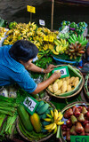 Fototapeta Paryż - fresh produce on sale on floating market in Thainland
