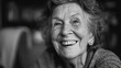 © Afflamen - Happy old woman laughing, black and white photo, close-up portrait