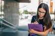 © tetxu - teenage student with backpack and folder outside school