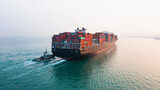 Fototapeta Uliczki - Aerial view Cargo container ship. Business logistic transpotransportation in the ocean ship carrying container,Cargo ship, Cargo container in factory harbor for import-export with copy space for text.