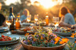 Outdoor dinner party at sunset with friends. Warm summer evening and dining alfresco concept for design and print. Sunlit festive table setting with copy space
