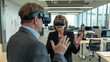 © MYDAYcontent - A man and woman are immersed in virtual reality experiences while wearing headsets in an office setting.