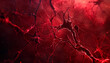 A close up of red blood vessels with a red background
