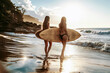 women are walking on the beach holding surfboards. The sun is shining brightly, creating a warm and inviting atmosphere. The women seem to be enjoying their time at the beach