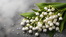 Lily Of The Valley Flowers With Water Droplets On Marbled Surface 