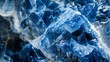 Blue mineral texture background. Beautiful macro shot of blue fluorite mineral surface.