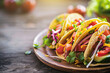 A vibrant taco bursting with fresh vegetables and succulent meat, showcased against a dynamic urban backdrop.