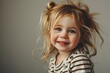 Portrait of a cute little girl with blond hair and blue eyes