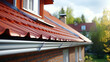 new renovated roof covered with shingles flat polymeric roof-tiles
