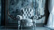 ornate silver armchair with tufted cushions sits in front of a dark blue background with silver accents.