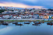 Vila Nova de Gaia, Portugal, on the Douro River across from Porto during a beautiful sunrise