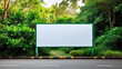 White billboard on spring summer green leaves background, Large horizontal blank advertising poster billboard mockup, framed by trees and plants, lush.