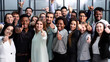 © Katsiaryna - Large Group of people standing together in studio showing thumbs up