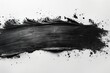 The modern texture of a dry brush stroke grunge is isolated on white spots of black with a modern distressed banner look....