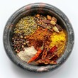 Mix of spices for homemade Tandoori masala in mortar on white background